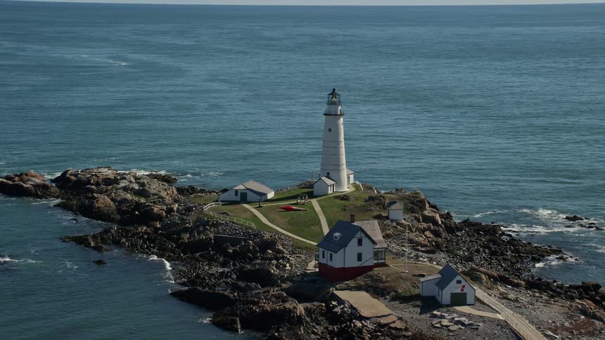 The lighthouse is on the edge of the island