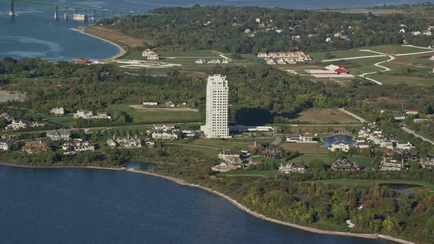 Panorama of houses by the sea with a central building