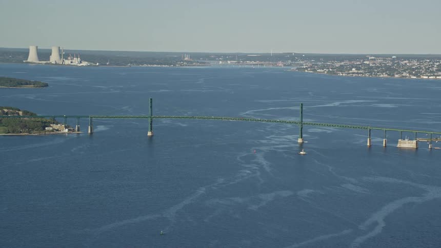 Vehicles travel over the large bridge