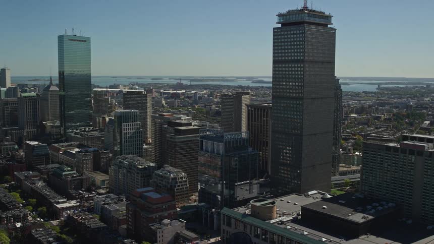 Buildings and skyscrapers in a city at midday