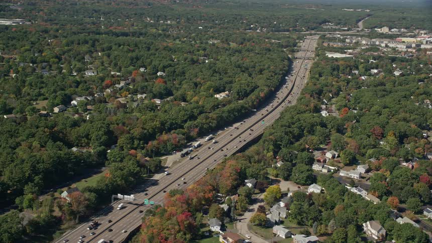 The highway runs through the suburbs