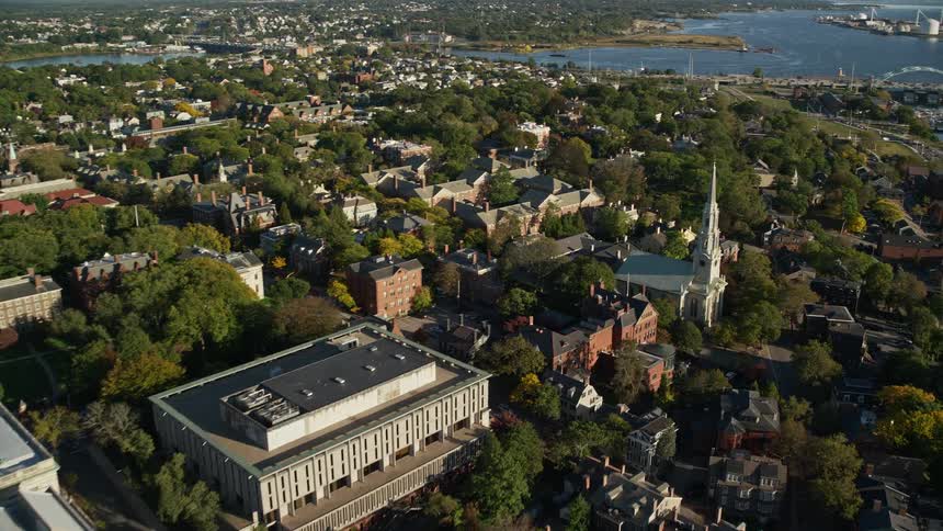 Aerial panorama of a seaside city with churches in the center