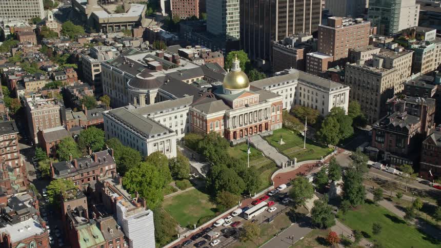 Apartment buildings surround gold domed building on opposite side of downtown from waterfront