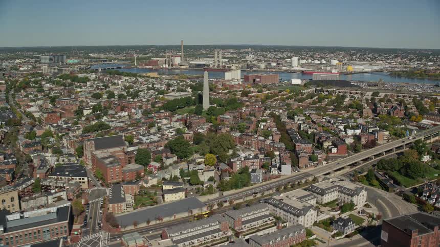 Aerial landscape of a city by the sea with bridges buildings and residential areas