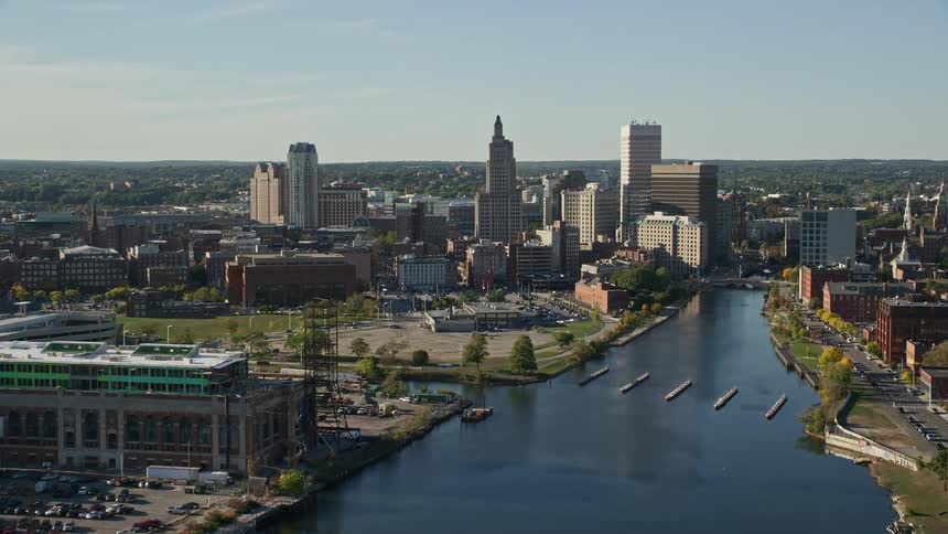 Aerial panorama of the skyline of a metropolis with a central lake