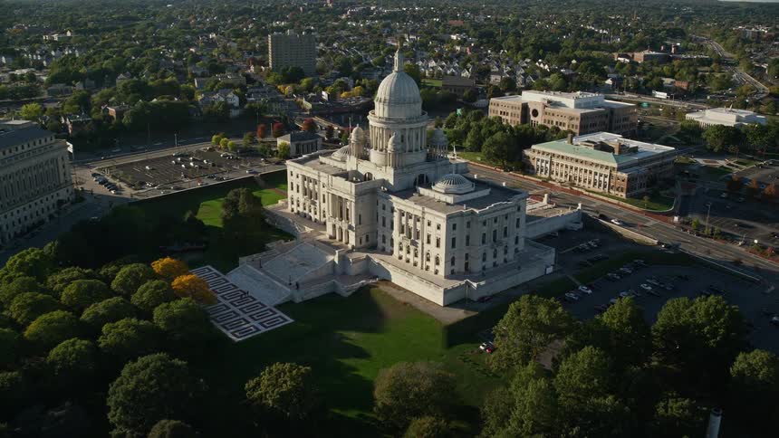 An aerial view of a large city with the white house at the center of it