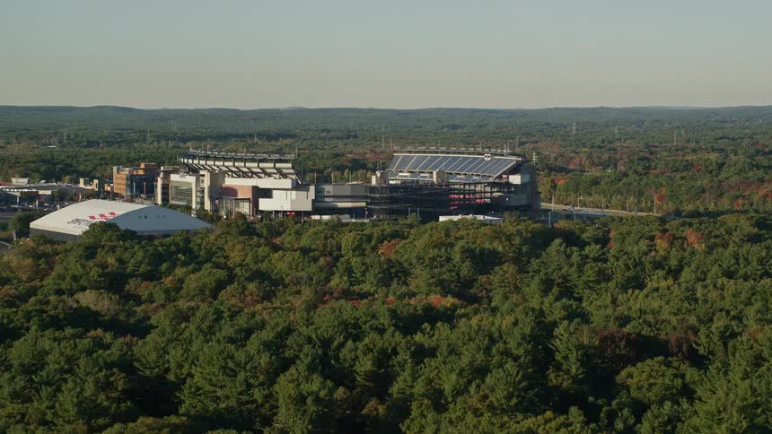 Aerial panorama of a stadium in the midst of nature
