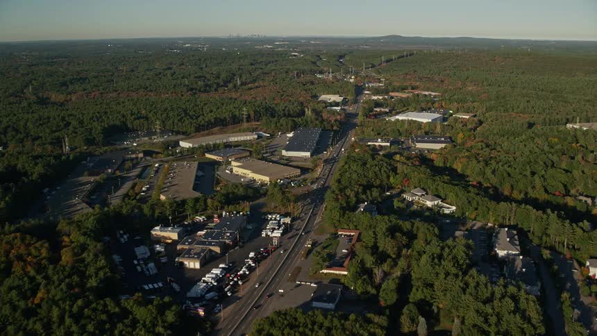 Aerial view of a highway through a small town