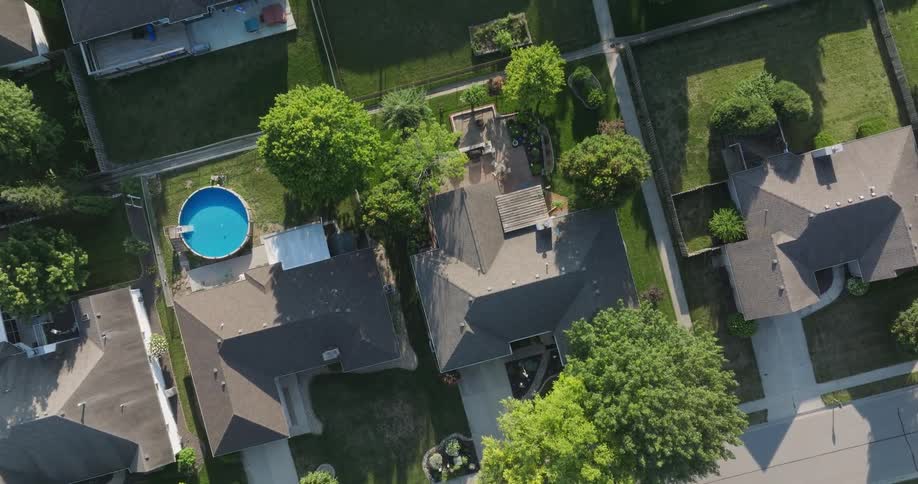 Slow overhead traverse of a peaceful and beautiful residential neighborhood