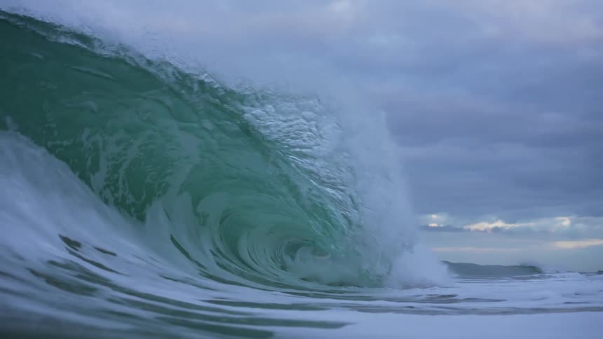 Sea waves at sunset