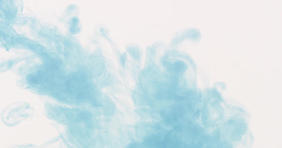 Cloud of blue ink flows down on a white background