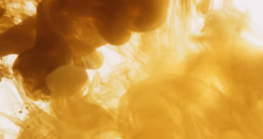 Yellow smoke falling on a white background