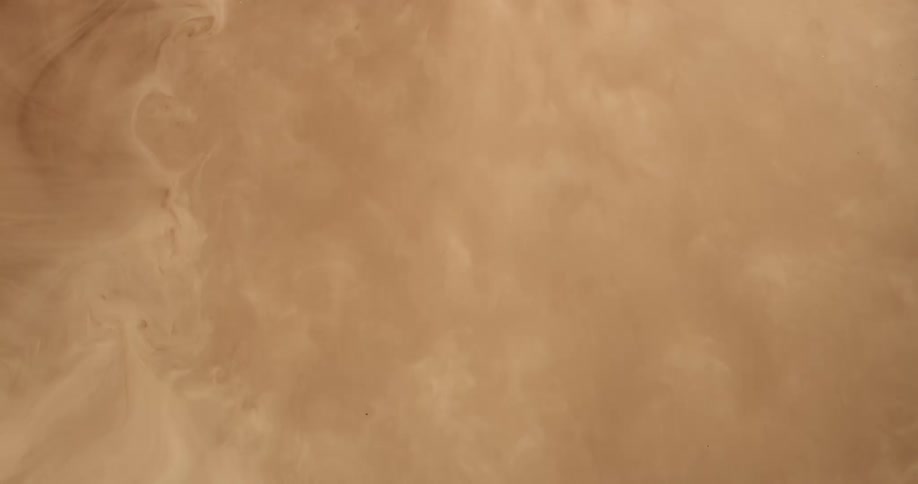 Abstract light colored smoke billows down