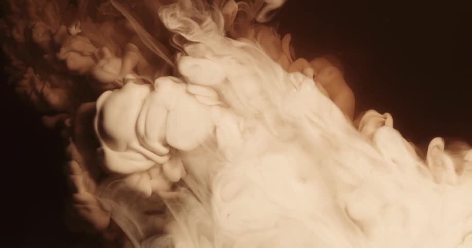 Dense abstract smoke being dispelled