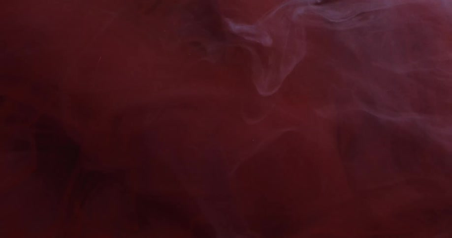 Abstract smoke in motion on a red background