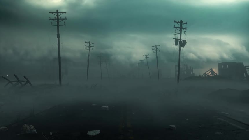 Clouds and smoke loom over a destroyed road