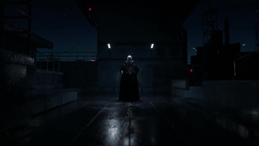 A sci fi character in all black stands in the distance at night