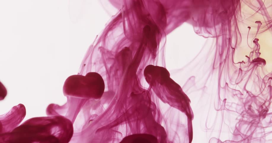 The red ink floats up in the water