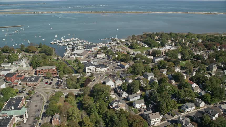 Aerial view of a small coastal town next to the ocean