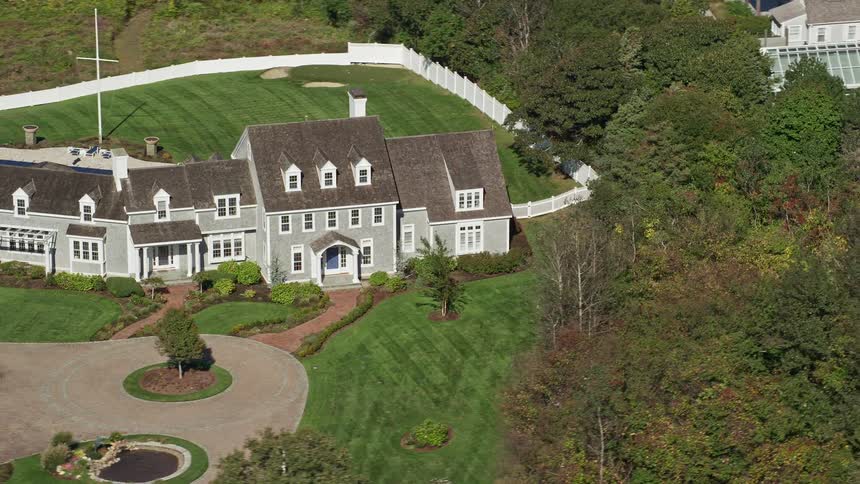 Aerial view of estate with green lawn