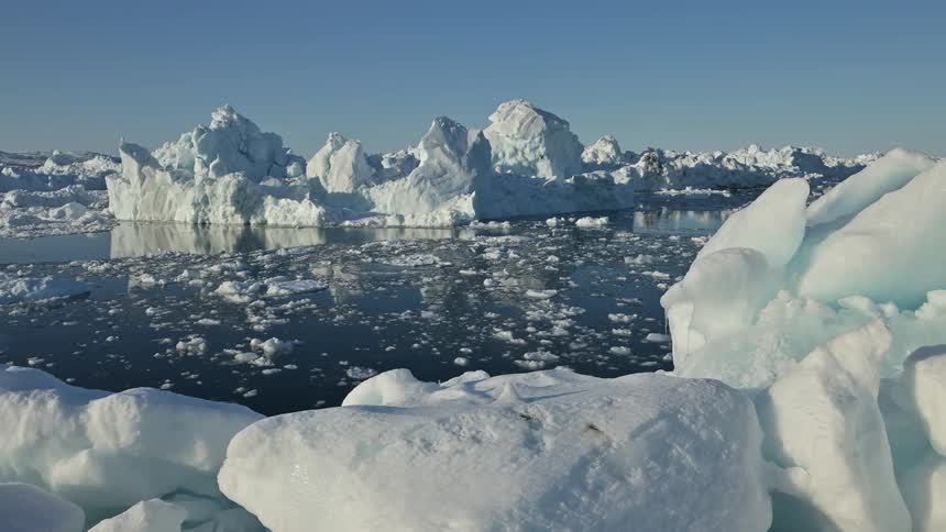 The water is filled with icebergs