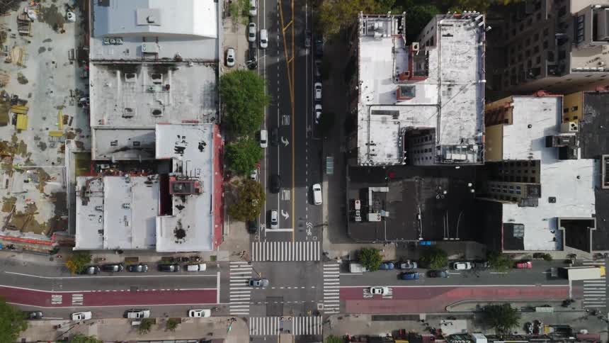Aerial view of the traffic on a suburban neighborhood during day time