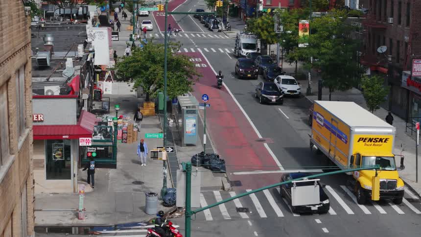 Aerial view of light traffic on a neighborhood in the city