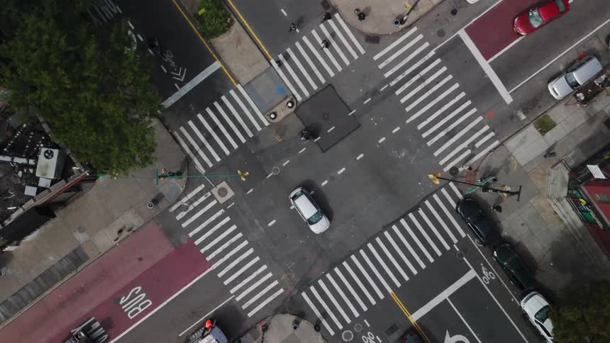 Aerial of the intersection with pedestrians crossing