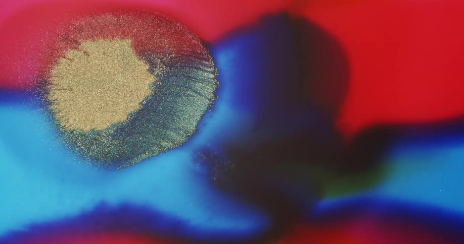 Colorful abstract liquid ink background with golden particles