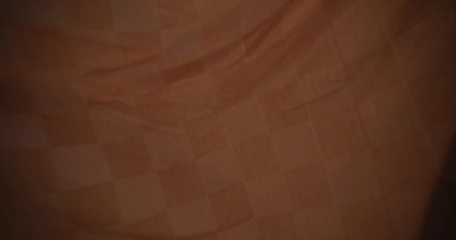 Brown towel blowing in the wind