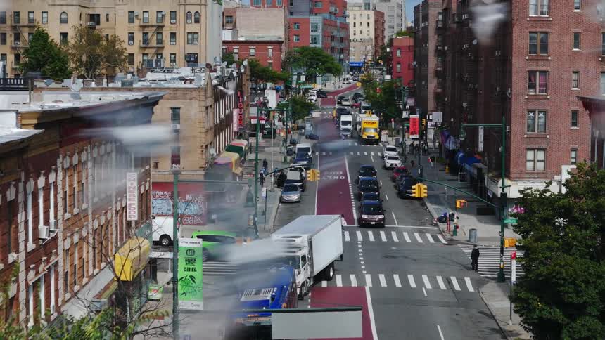 Aerial of a busy neighborhood street during the day