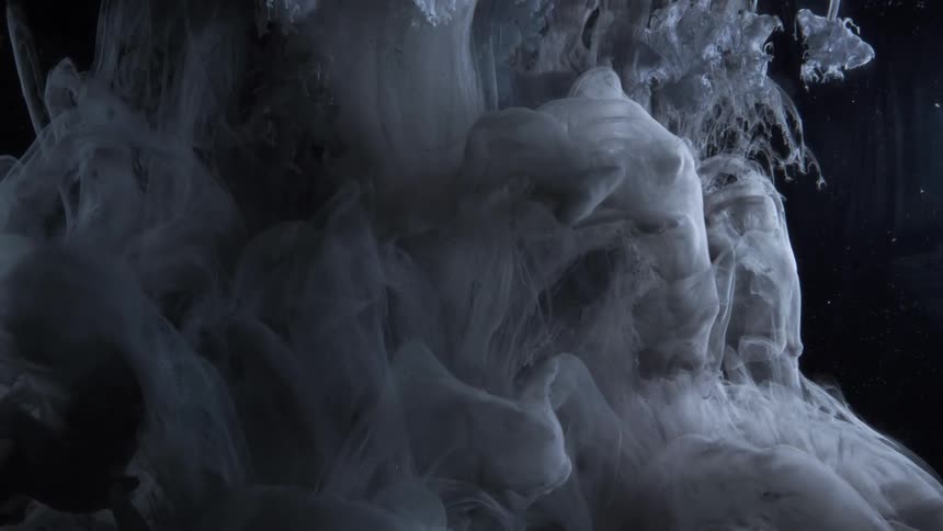 Abstract white ink fluid falling in slow motion