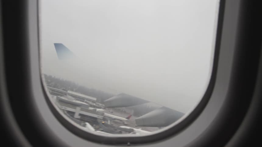Airplane taking off as seen from the passenger window