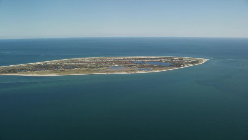 A small island in the middle of the ocean