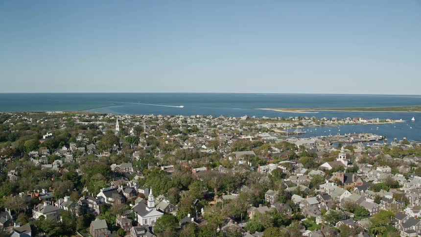 Aerial view of coastal city with waterfront houses