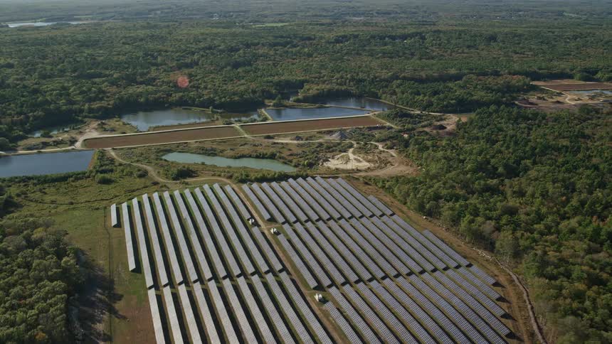 Aerial view of large solar panels in the plains