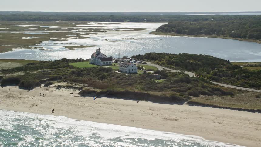 Aerial panorama of a hotel amidst a natural beach