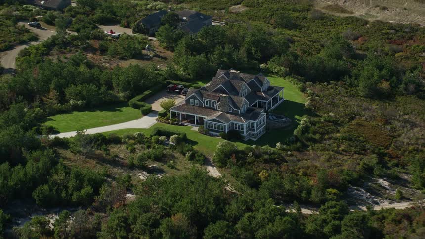 Aerial view of a manor near the marsh