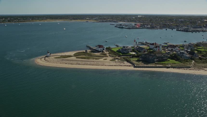 Oceanfront houses with a view of the nantucket harbor lighthouse in nantucket massachusetts