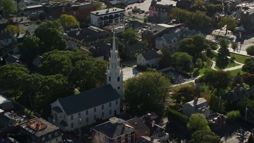 Aerial panorama of a church amidst a residential city