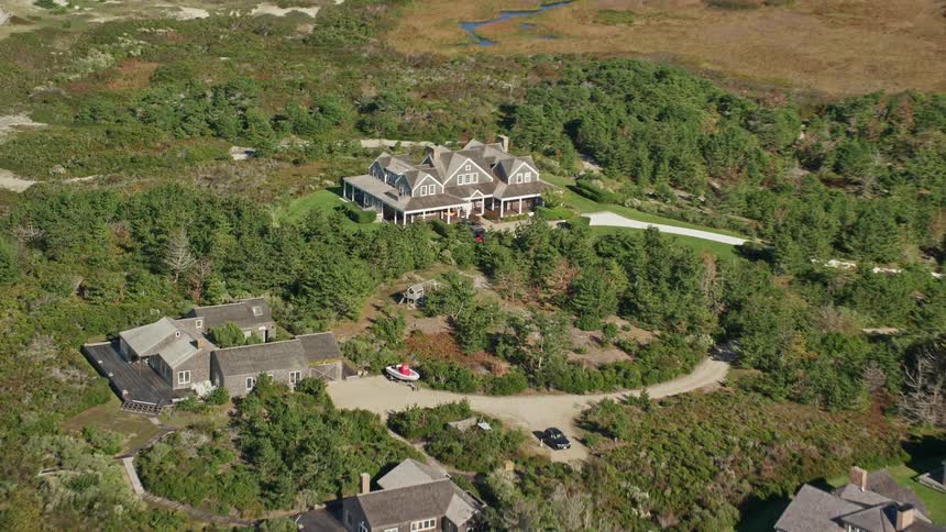 Aerial panorama of mansions in a natural environment with trees and green areas