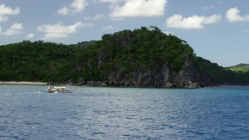 A boat is moving in the water ahead
