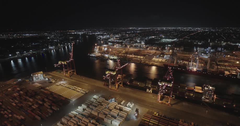 Aerial of containers in a port at night