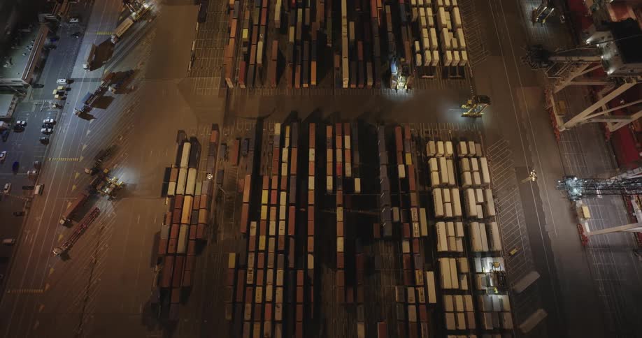 Vehicles are driving around the port