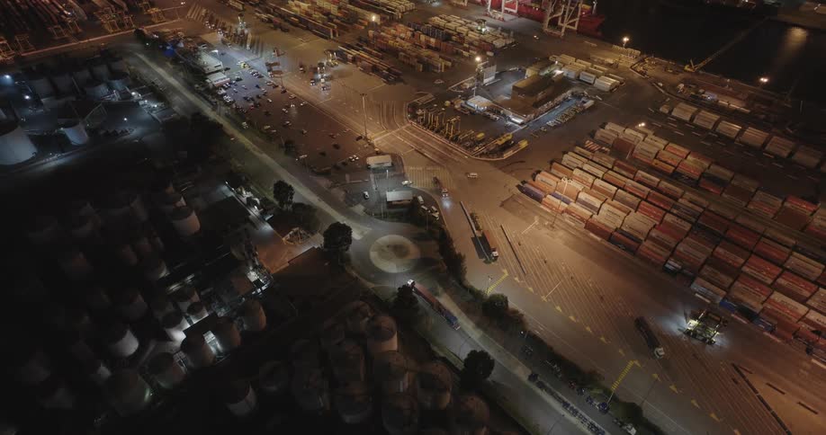 Aerial panorama of a port with containers at night