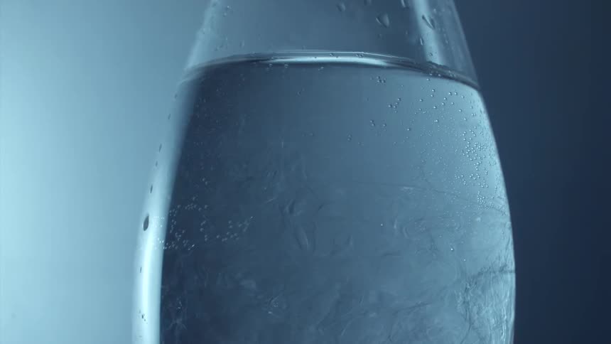 Glass cup with ice water