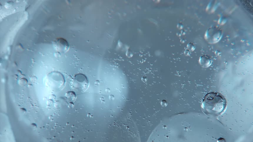 Air bubbles floating under ice