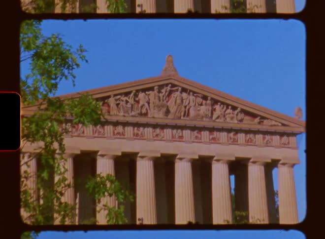 A construction of ancient architecture with supporting pillars and statues at the top
