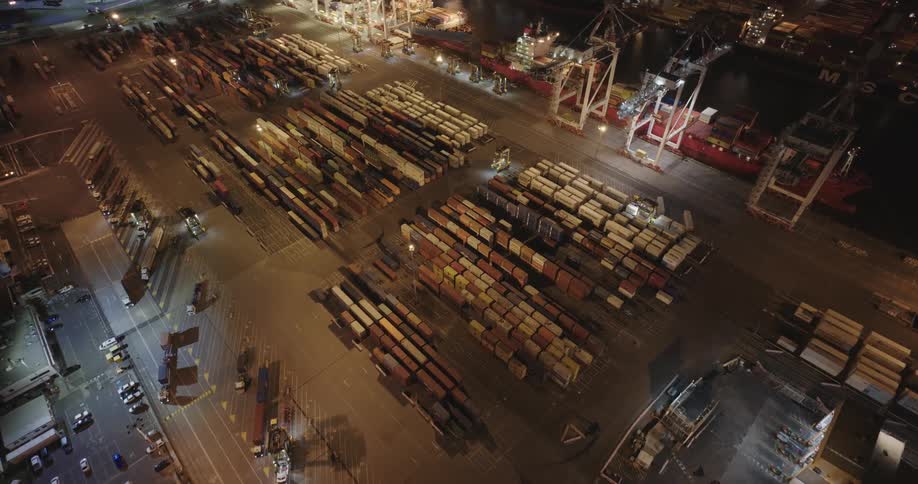 Aerial panorama of containers at a port during the night