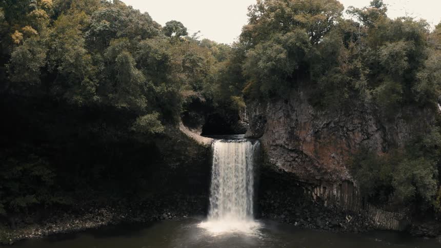Aerial view of a waterfall in the mountains